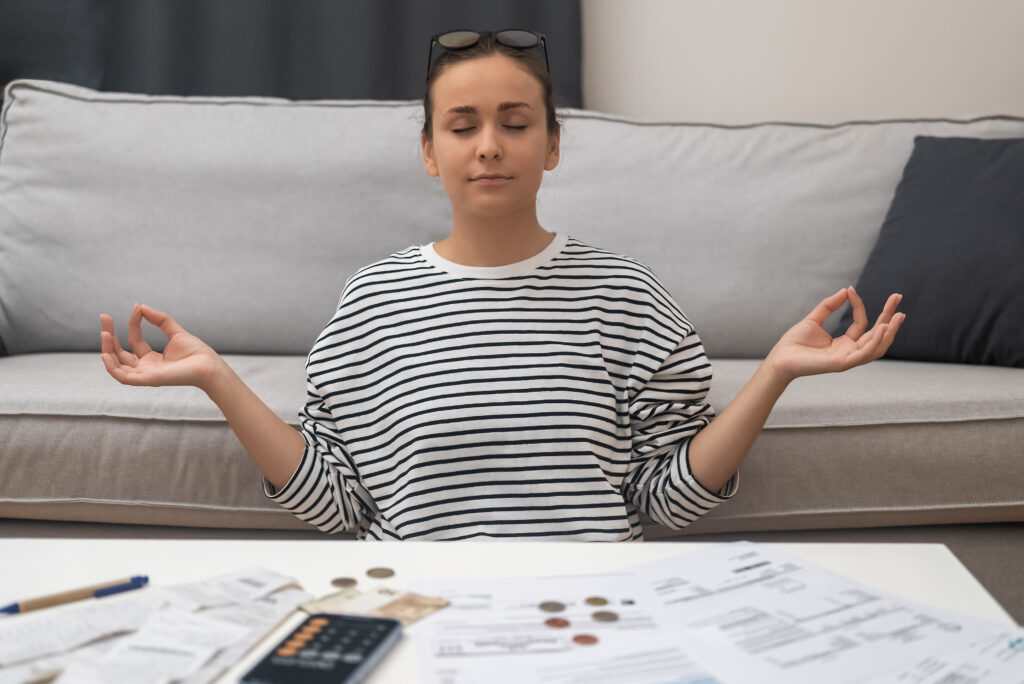 Yoga pose with tax forms